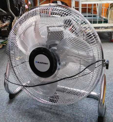 A Blau Punkt 16" chrome floor fan.