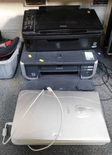 A Canon IP4300 printer, an Epson stylus SX515W printer, and a Microtek printer. (3)