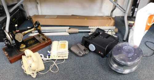 A Singer sewing machine, cased, together with a Palar screen, a Viewmaster, Tefal Steam Cuisine,...