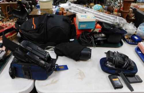 A Nikon telephoto lens, with ultraviolet filter, a Sony Video 8 Handycam, further camera...