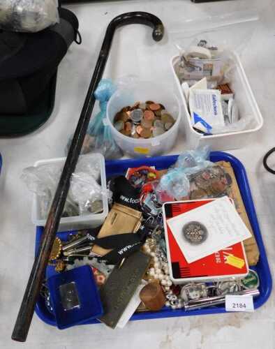 Assorted costume jewellery, a silver topped walking cane, coinage, fountain and ballpoint pens,...