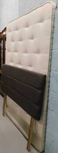 A king size mattress on divan style base.