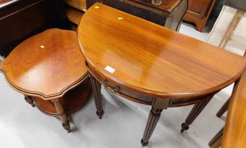 A mahogany finish demi-lune side table, with frieze drawer on reeded legs, and a coffee table.