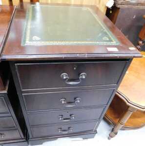 An office pedestal side cabinet, with four faux drawers forming two drawers, surmounted by a...