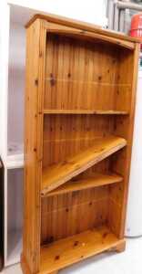A pine freestanding open bookcase, with adjustable shelves, and another.