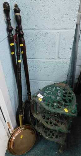 An iron graduated pan stand and various copper warming pans. (a quantity)