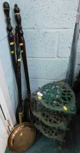 An iron graduated pan stand and various copper warming pans. (a quantity)