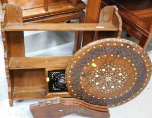 An Eastern pine finish hanging shelf, and a further heavily carved table with removable circular...