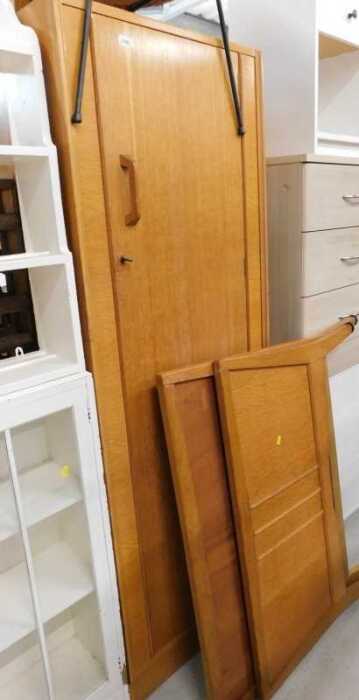An EG Gomme light oak single wardrobe, with shaped handle, and a similar design single bed.