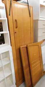 An EG Gomme light oak single wardrobe, with shaped handle, and a similar design single bed.