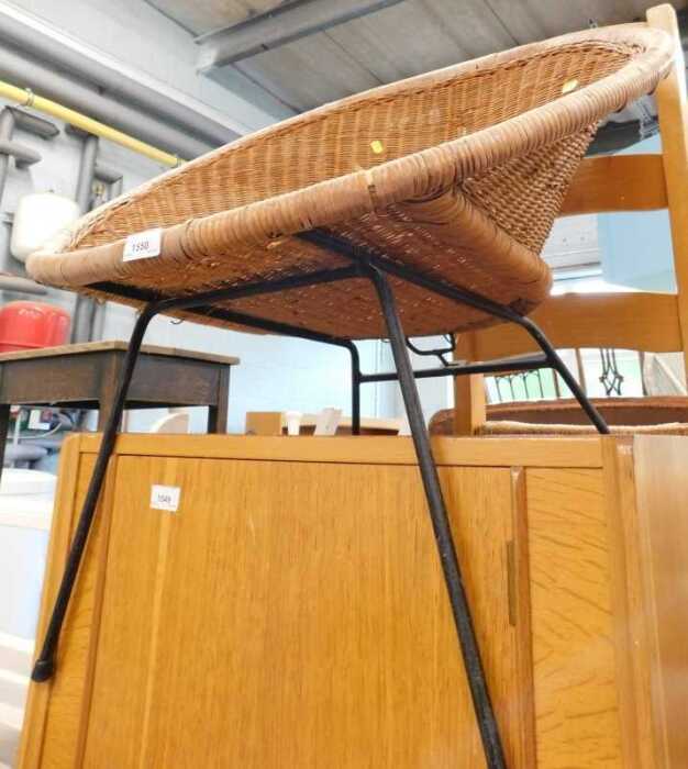 A Sputnik style basket weave chair, on metal frame.