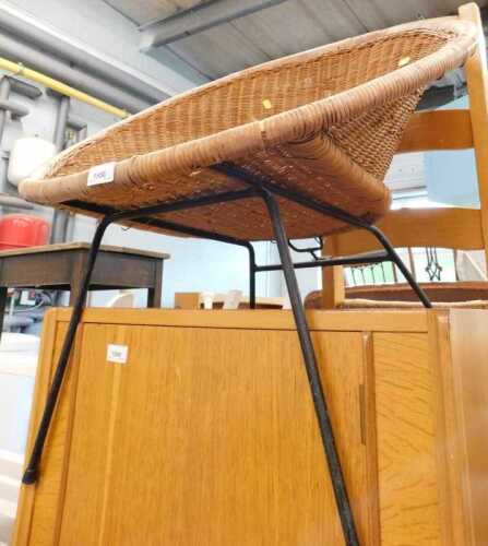 A Sputnik style basket weave chair, on metal frame.