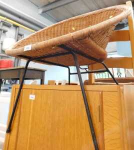 A Sputnik style basket weave chair, on metal frame.