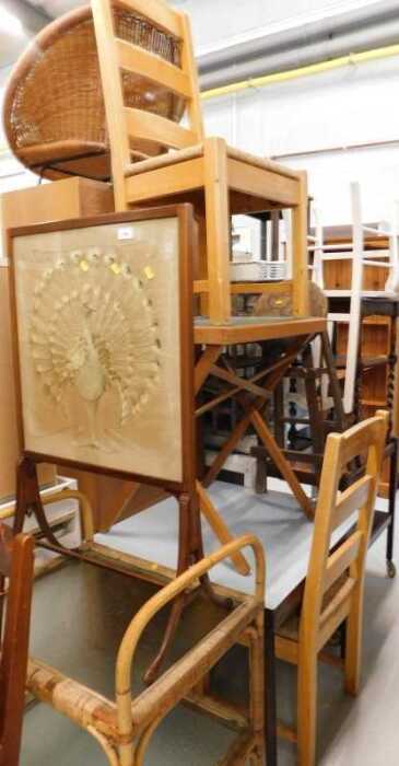 An early 20thC firescreen, with embroidered peacock design, two tier wicker trolley, various...