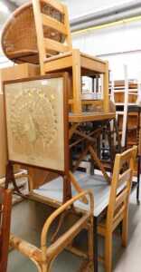 An early 20thC firescreen, with embroidered peacock design, two tier wicker trolley, various...