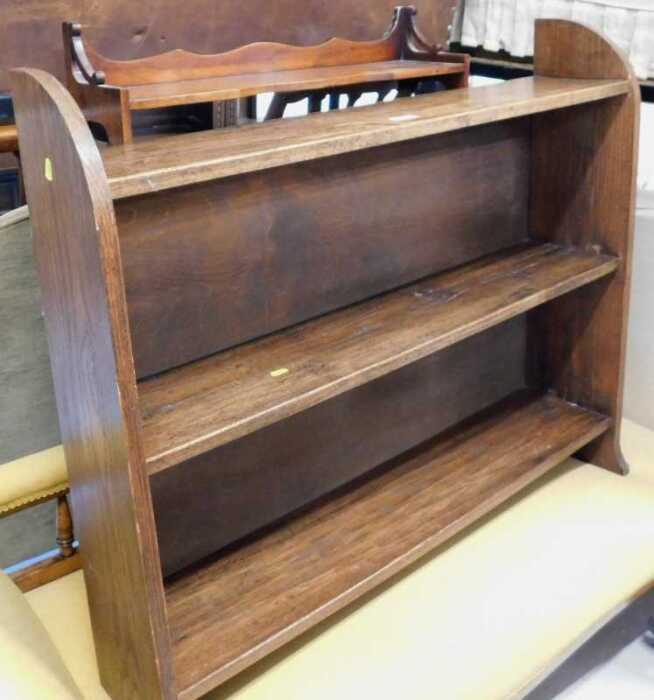 An oak bookcase, and a mahogany hanging bookcase.