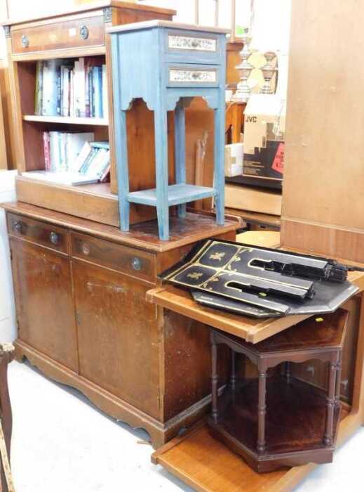A yew wood finish open bookcase, with single drawer above open shelves, with a quantity of books,...
