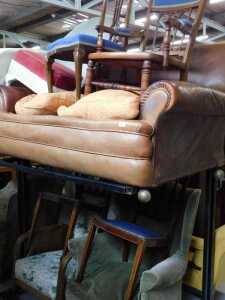 A leather two seater sofa, Lloyd Loom style chair, various other chairs, Edwardian and other...
