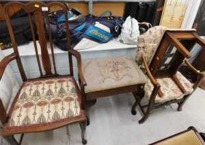 An Edwardian mahogany elbow chair, overstuffed stool, early 20thC oak stool with overstuffed...