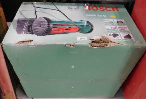 A Bosch AHN38G push lawnmower, boxed.