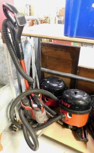 Various hoovers, Henry hoover, another and an upright vacuum cleaner Shark Duo.