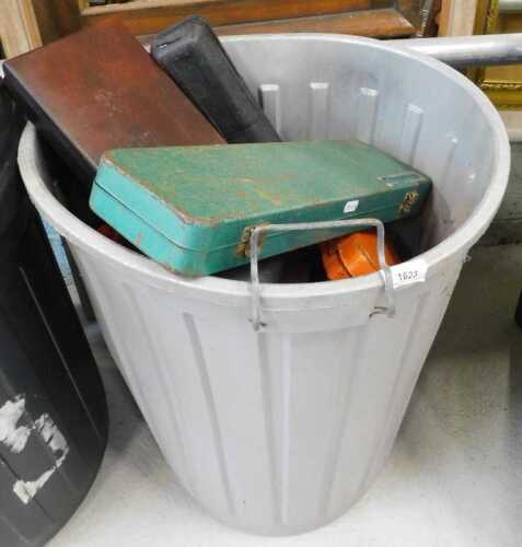 An industrial open bin containing a quantity of hand tools, part sets, a Challenger part socket...
