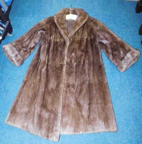 A 20thC Griffin & Spalding lady's fur coat, three quarter length.