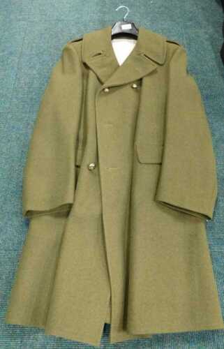 A green khaki woollen three quarter length army Great Coat, with late gilt buttons, size unknown.