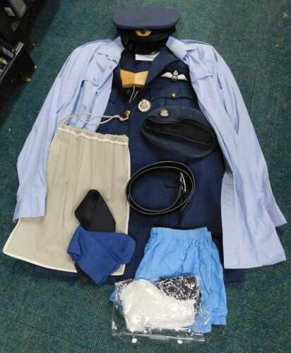 A replica Royal Air Force officer's uniform, to include jacket, shirt, peaked cap, etc.