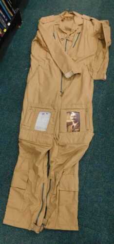 A Coyote brown tactical soft shell or waterproof jacket, with dual angle chest pocket, size...