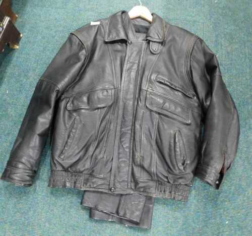 A gentleman's three quarter length leather jacket, in black, with associated trousers, size...
