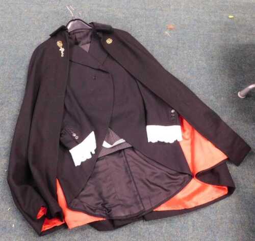 A pair of pinstripe trousers and a woollen Male by Paul Carnaby Street London Sportive jacket,...