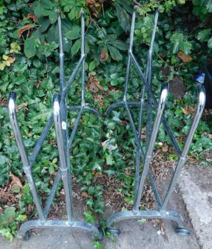 V - Two chrome plated folding part stands on wheels. Note: VAT is payable on the hammer price of...