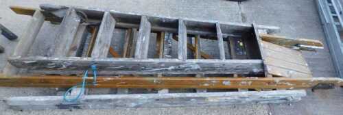 Various wooden folding step ladders.