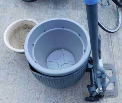 Dolly tub, sack barrow, planter, and two further plastic planters. (a quantity)
