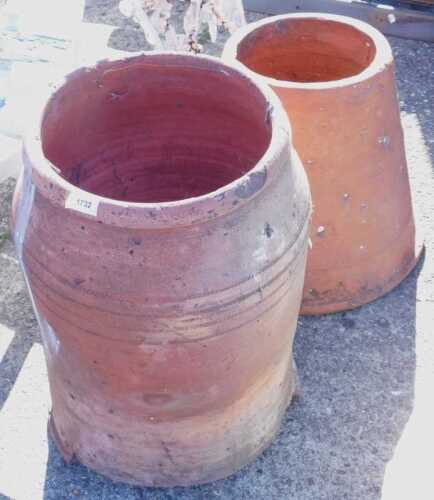 A 20thC terracotta open ended rhubarb pot, 53cm, together with a second conical terracotta open...