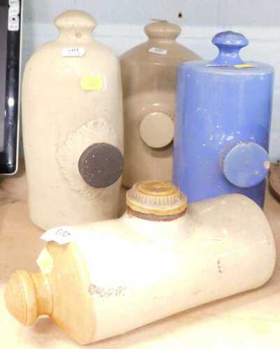 Various ceramic hot water bottles, brown and blue glazed. (4)