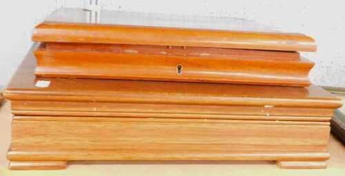 Two empty wooden cutlery canteen boxes.