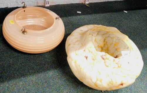 Two mid century glass lamp shades, one in peach with three hooks, and another in mottled marble...