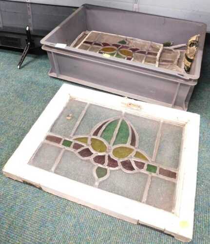 A stained glass window, with wooden frame, 30cm x 43cm, together with other part windows, glass,...