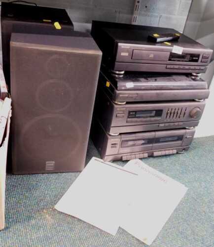 A Sharp model CMS-R250 turntable, twin tape cassette decks, DVD player, speakers.