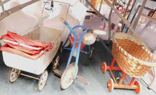 Mid century children's toys, to include a Mobo Toys pedal tricycle, wooden pull along basket,...