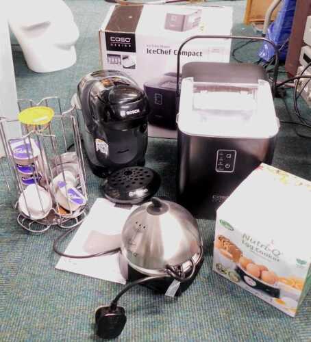A Caso Design Ice Chef Compact ice cube maker, in box, together with a Nitro Q egg cooker, and a...