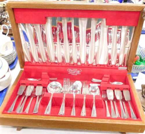 A patented Tarnprufe canteen of cutlery, including spoons, knives, forks.
