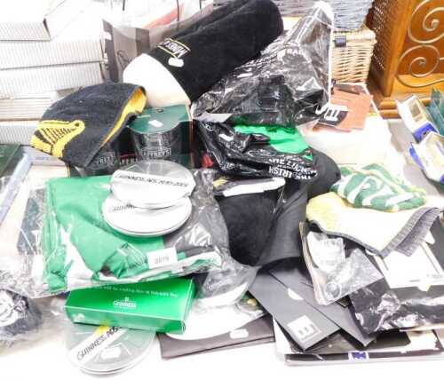 Guinness promotional memorabilia, to include Guinness slippers, Guinness Summer of Football 2000...