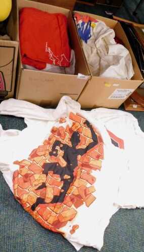 A quantity of T-shirts, mainly running and competition winner shirts.