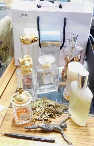 A quantity of novelty perfume bottles, to include Roma, Jean Paul Gaultier, and others. (a...