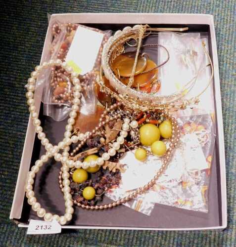 A group of assorted costume jewellery, to include a Jaeger belt/necklace, various tiaras,...