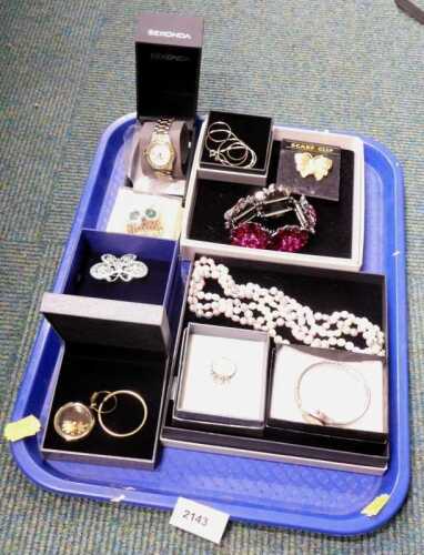 A lady's Sekonda gem set bicolour wristwatch, owl and butterfly brooch, floral bracelet, jigsaw...