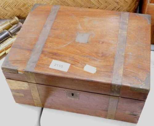 A writing slope, with internal compartments, black tooled leather writing surface, brass corners,...